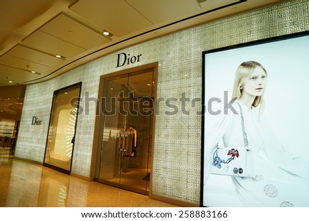 SHANGHAI, CHINA - March 8. 2015: Interior of the IFC Shopping Mall downtown in Pudong Lujiazui. Dior inside Just The international women\'s day at March 8. 2015 Shanghai, China