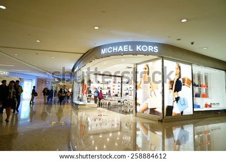 SHANGHAI, CHINA - March 8. 2015: Interior of the IFC Shopping Mall downtown in Pudong Lujiazui. Michael Kors brand store inside Just The international women\'s day at March 8. 2015 Shanghai, China