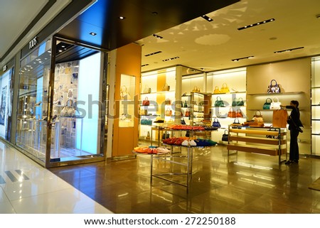 SHANGHAI, CHINA - APRIL. 22, 2015: Interior of TOD\'S brand store at the IFC Shopping Mall in Lujiazui PUDONG. Italian brand produces luxury shoes and leather goods with stores around the world.