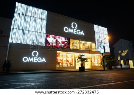 SHANGHAI-APRIL 22,2015 Omega outlet night.Omega watches were the choice of NASA and the first watch on the Moon in 1969. Omega has been the official timekeeping device of the Olympic Games since 1932.