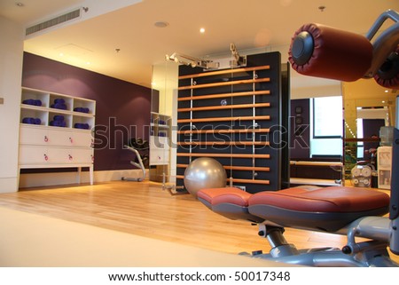 Hotel room with gym equipment