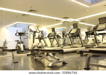 Hotel room with gym equipment