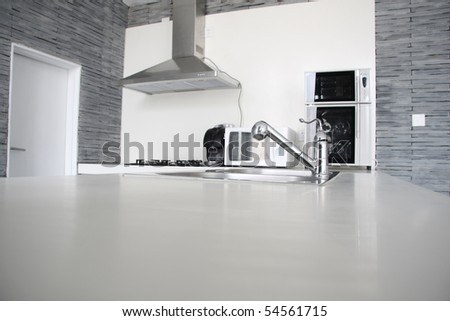 Kitchen interior in family house in white