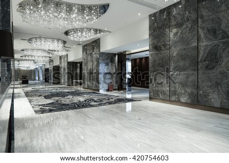 Luxury lobby interior.With crystal lamp,bing hall, marble floor, french sash,mosaic tile,comfortable sofa, etc.