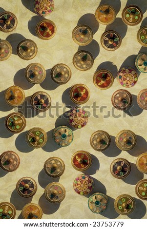 jewel box circles on pumpkin seed pattern parchment background
