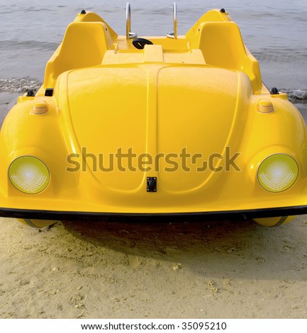 stock photo yellow car pedalo