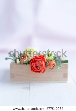 ranunculus flowers in a box