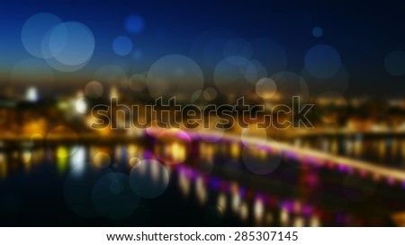 Bridge lights with night river reflection and light circles