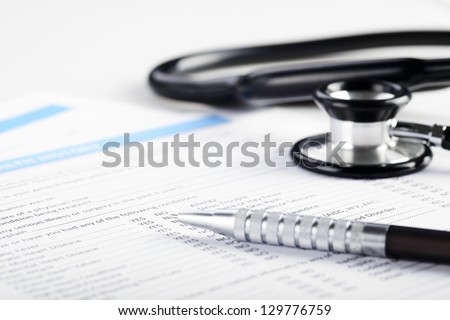 Filling Medical Form, document,  stethoscope