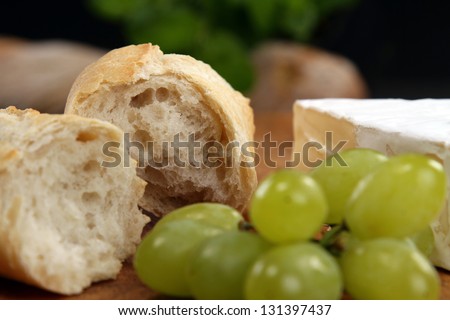 Food Products - cheese, bread and grapes