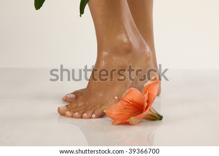 Pedicured feet with beautiful flowers
