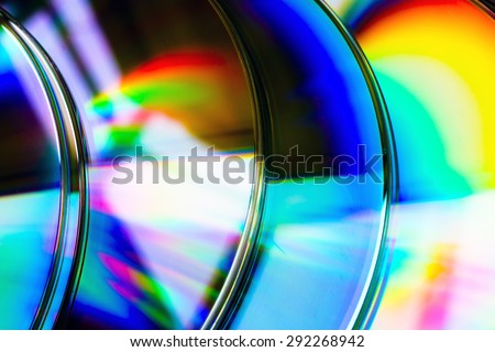 abstract background cd disk with defocused refraction of light in reflection