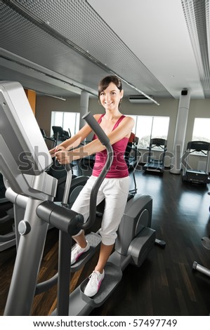 Young woman at the fitness club