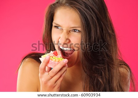 Cute young girl wanted tasty cake badly