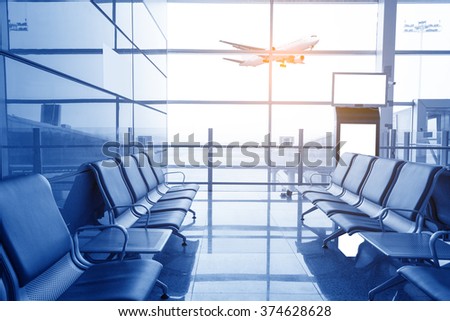 contemporary lounge with seats in the airport, blue tone