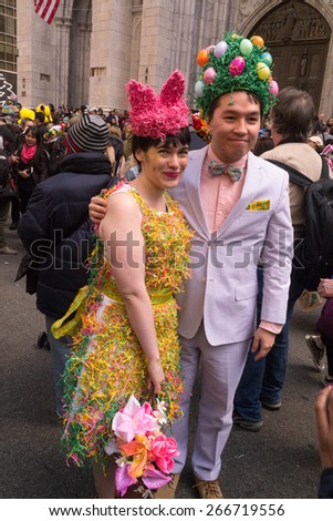 NEW YORK - APRIL 5:  A couple dressed up in Easter attire in front of St. Patrick\'s Cathedral during The 2015 Easter Parade
