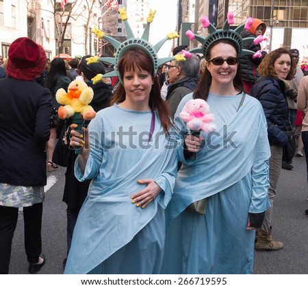 NEW YORK - APRIL 5:  Two woman dressed up as The Statue of Liberty during The 2015 Easter Parade and Easter Bonnet Festival in New York City