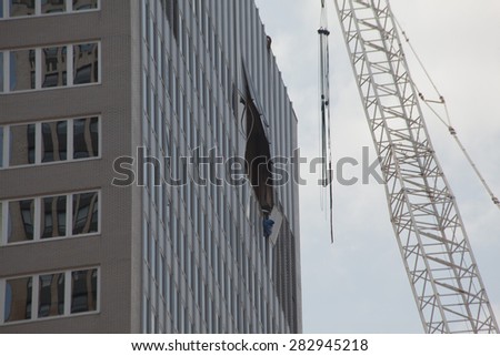 NEW YORK - MAY 31: AC Unit Falls From Crane in Midtown Manhattan