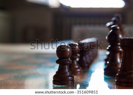 Chess pieces in position at the beginning of a match