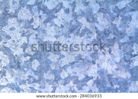 Tin-play, sheet. Metal background in grey and blue.