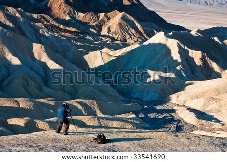 Nature Photographer at Death Valley Badlands, California.