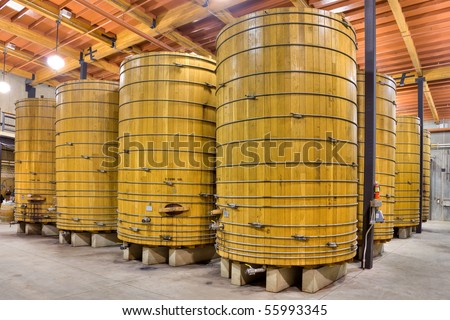 Large Wooden Casks in a California Winery Cellar.