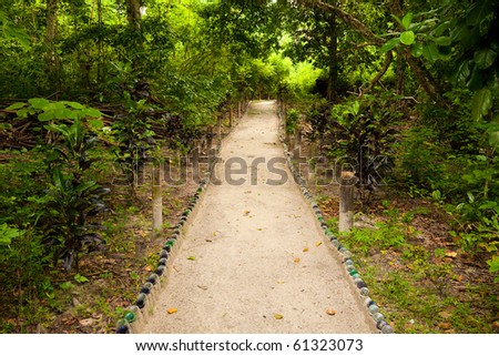 Path lined with bottles at a resort on Havelock Island, Andaman and Nicobar Islands, India.