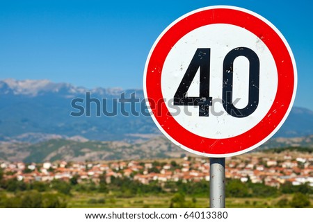 Selective focus image of an old speed limit road sign in rural Bulgaria.
