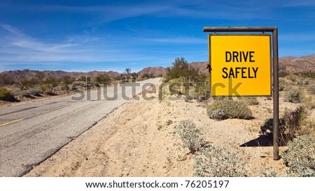 Drive Safely road sign at the South entrance to Joshua Tree National Park, California.