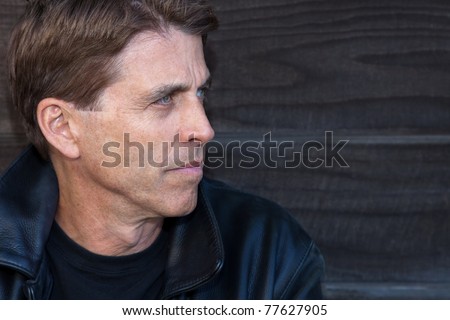 Handsome middle aged man profile portrait.