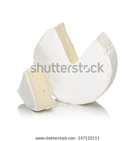Round Camembert Cheese With A Cut Out Piece Isolated On White With Reflection