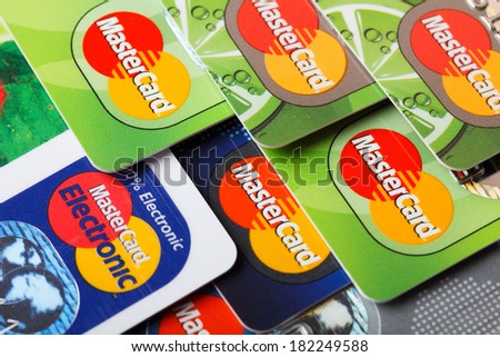 KIEV, UKRAINE - March 11: Pile of credit cards, MasterCard, credit, debit and electronic, in Kiev, Ukraine, on March 11, 2014.