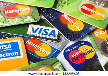 KIEV, UKRAINE - March 11: Pile of credit cards, Visa and MasterCard, credit, debit and electronic, in Kiev, Ukraine, on March 11, 2014.