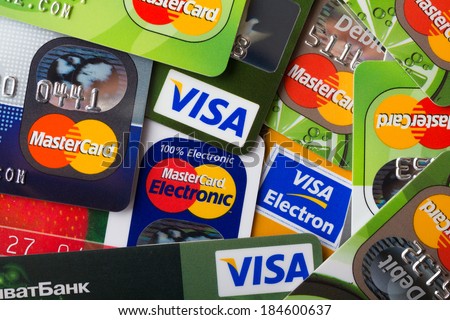 KIEV, UKRAINE - March 28: Pile of credit cards, Visa and MasterCard, credit, debit and electronic, in Kiev, Ukraine, on March 28, 2014.