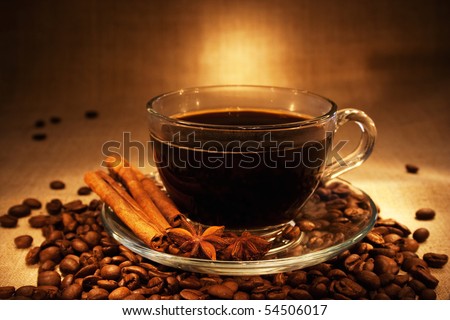 dark coffee with cinnamon still-life in dark soft ambient light