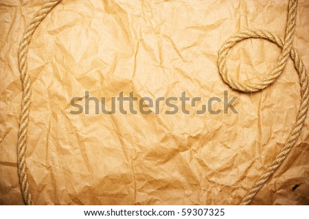 rope on aged yellow paper