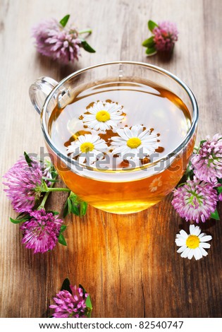 hot herbal tea with clover and chamomile