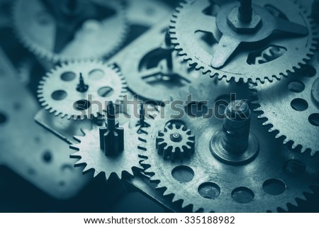 Gears and cogs macro, blue toned
