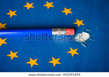 European Union flag with one star removed by pencil eraser, concept of Brexit as Britain vote to leave