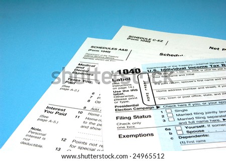 Federal Income Tax Forms on Blue Background