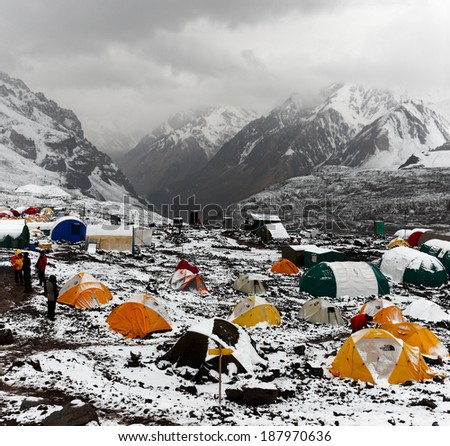 MENDOZA, ARGENTINA - JAN 18: Plaza de Mulas base camp covered of snow in summer. This year, 5400 people faced the mountain intend to get the summit. Jan 18, 2014 in Aconcagua Mount, Mendoza, Argentina