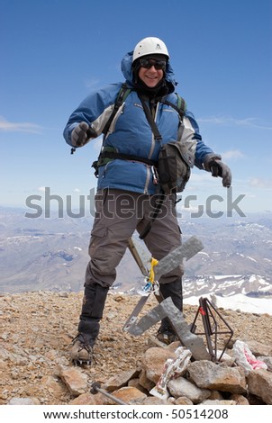 DOMUYO MOUNT - FEB 04: Alfredo Cerra, amateur climber in the summit, 4700m. Adventure tourism attracts people to areas that where only for pro climbers. Feb 04, 2010 in Domunyo Mount, Argentina