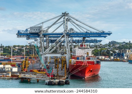 Industrial Container ship in the harbor - international freight shipping, Auckland, New Zealand