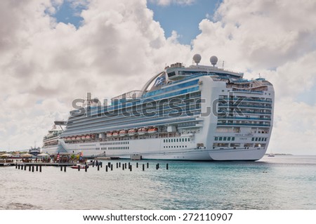 KRALENDIJK, BONAIRE - DECEMBER 2: International Cruise Ship Emerald Princess anchored at Kralendijk the capital and largest city of the island Bonaire, Netherlands Antilles at December 2, 2011.