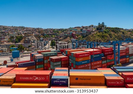 VALPARAISO, CHILE - DECEMBER 3: View to the cargo sea port and residential area of Valparaiso city on December 3, 2012 in Valparaiso, Chile. Valparaiso sea port is the busiest one in Chile.
