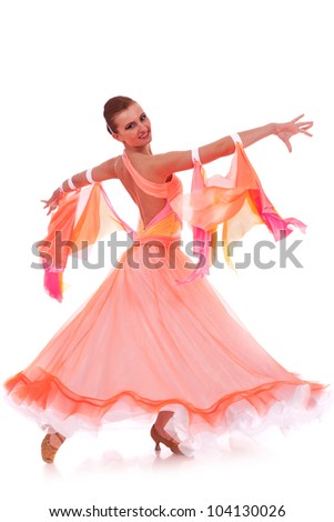 side view of a beautiful woman dancer in a waltz dance move on white background