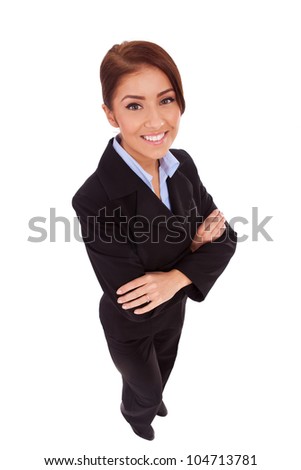 happy business woman with her arms crossed (isolated on white) - wide angle shot