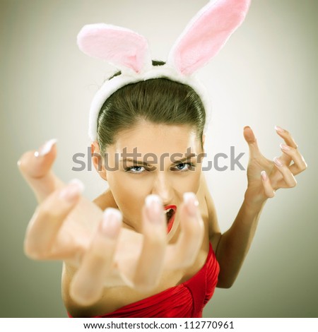 evil bunny woman screaming and reaching to get you - vintage look picture