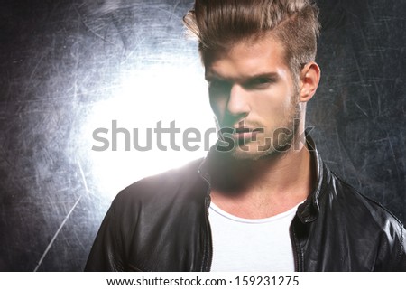 close picture of an attractive male model looking at the camera