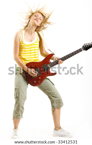 stock photo headbanging woman guitarist playing her guitar